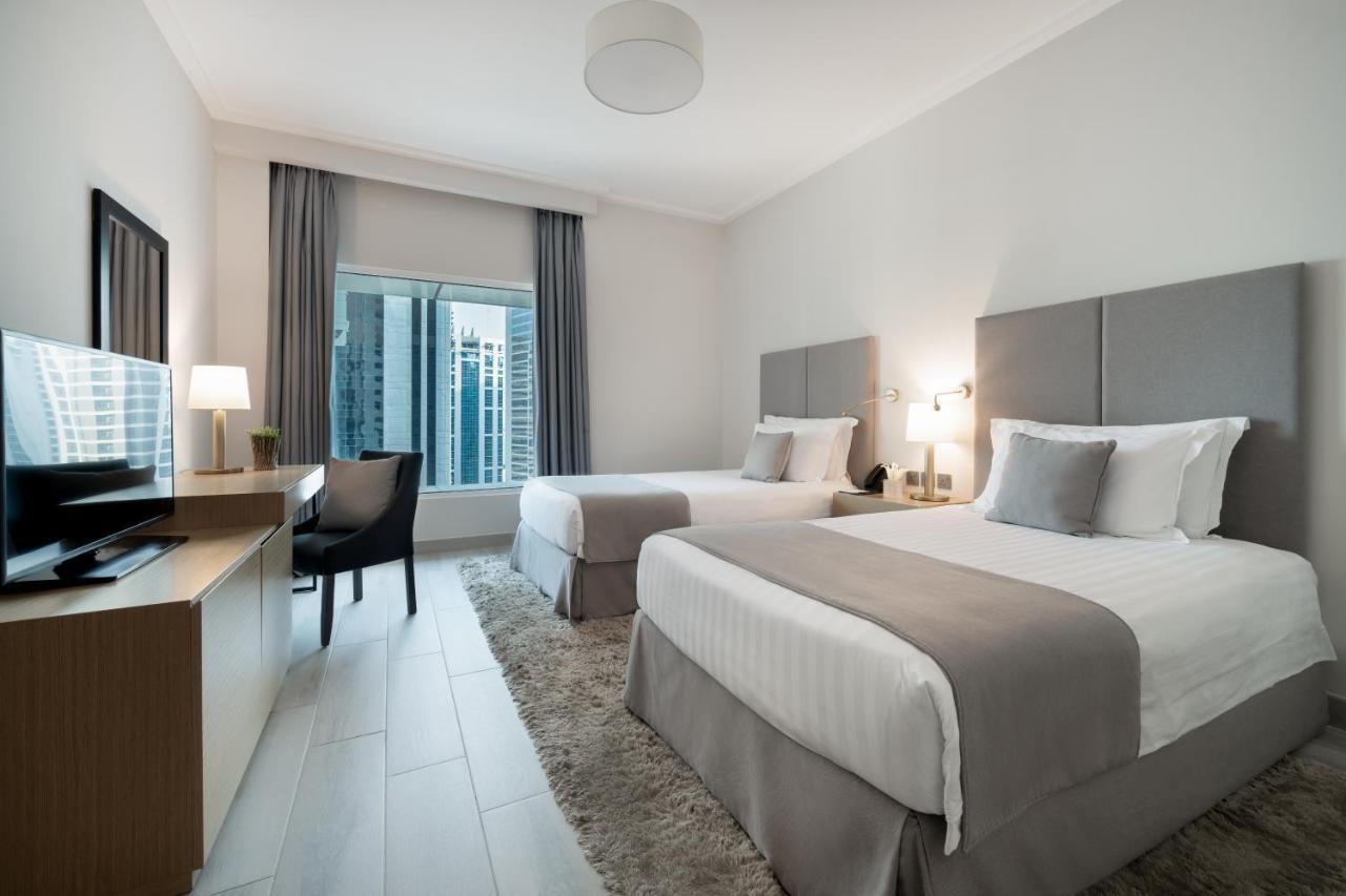 Centara West Bay Hotel & Residences 多哈 外观 照片 A typical guest room at the hotel